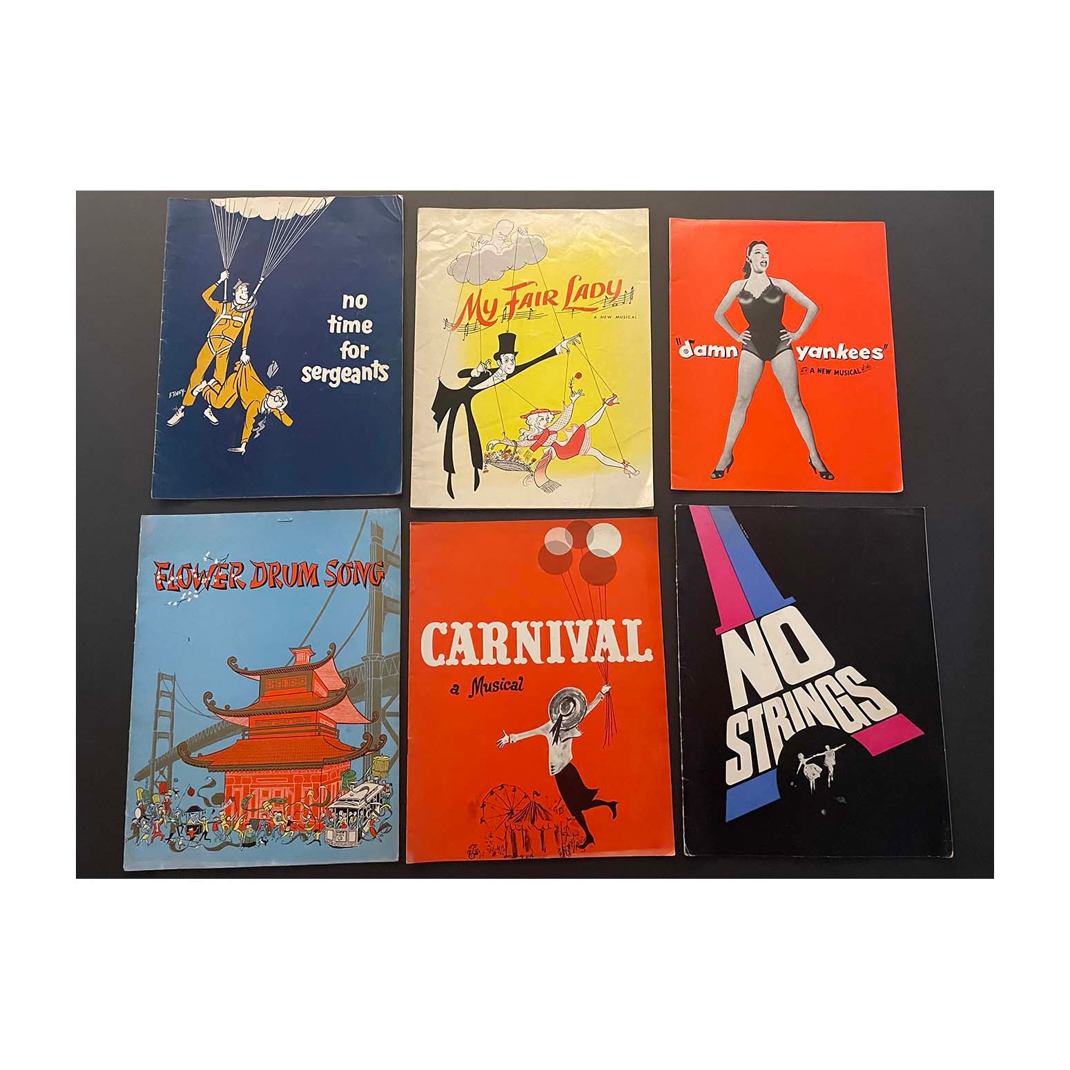 Collection of original official souvenir programmes for Broadway theatres. Includes&nbsp;My Fair Lady at Mark Hellinger Theatre (1956), No Time for Sergeants at Neil Simon Theatre (1955), No Strings at 54th Street Theatre (1963), and Flower Drum Song at St James Theatre (1958).